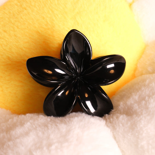 KapKap juoda gėlytė