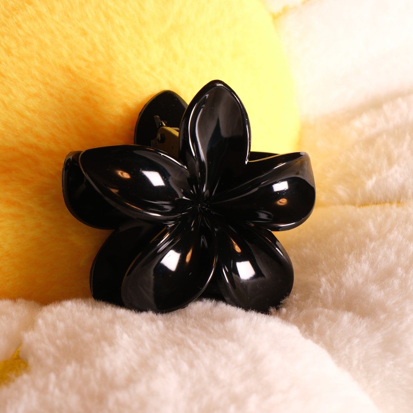 KapKap juoda gėlytė